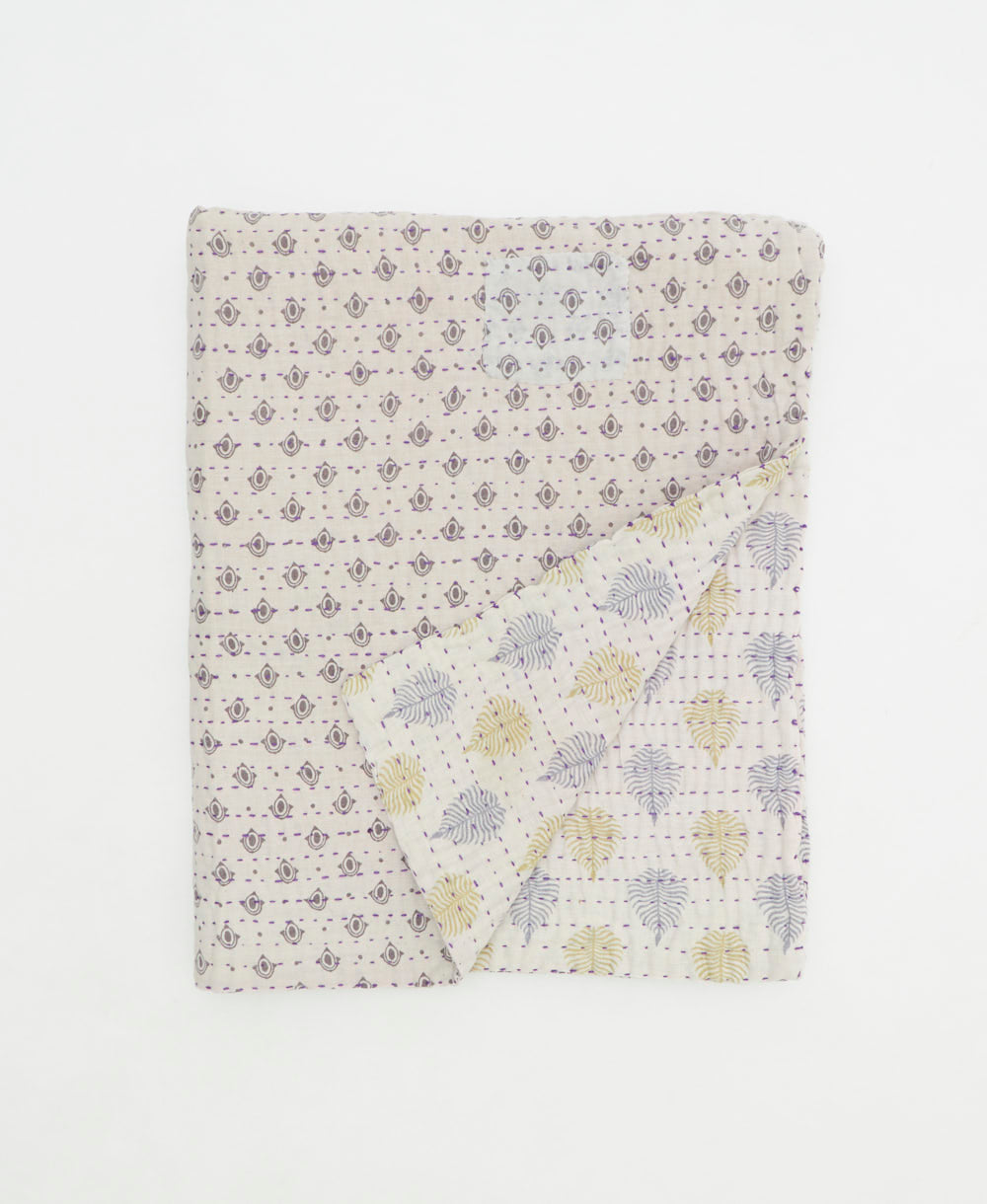 small kantha quilt handmade in India by women artisans from vintage cotton saris