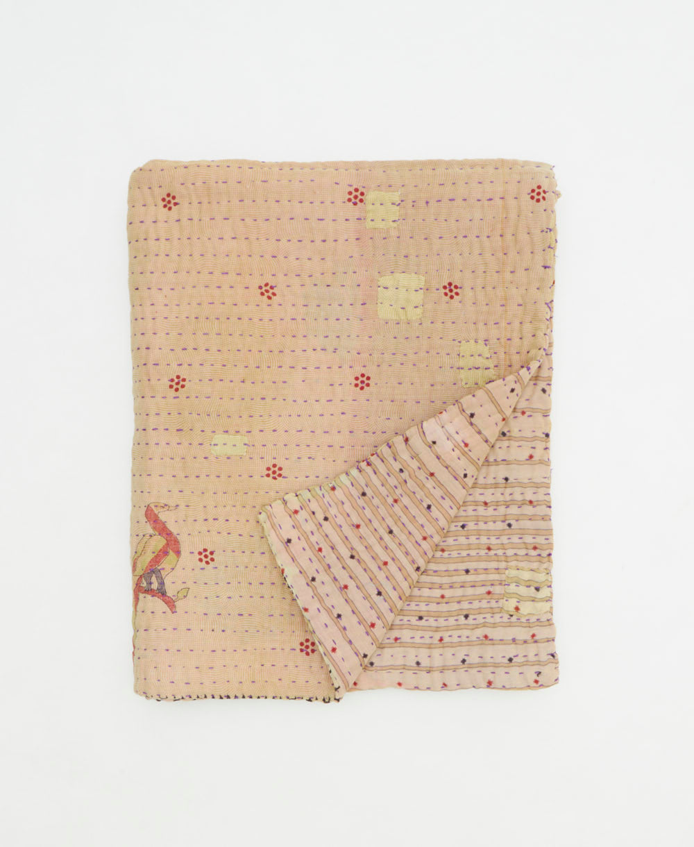 small kantha quilt handmade in India by women artisans from vintage cotton saris