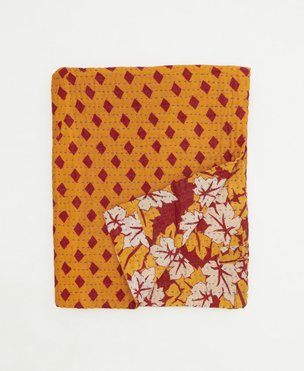 small kantha quilt handmade in India by women artisans from vintage cotton saris