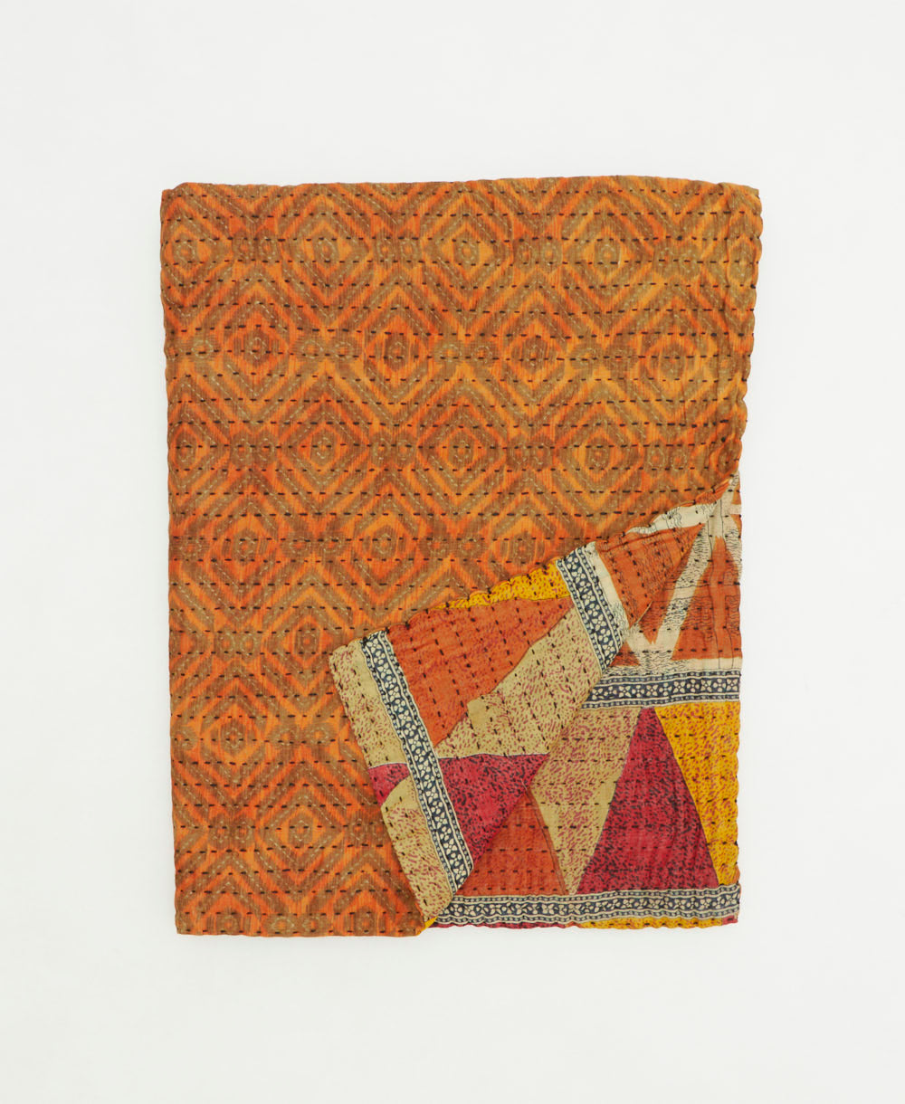 small kantha quilt handmade in India by women artisans from vintage cotton saris