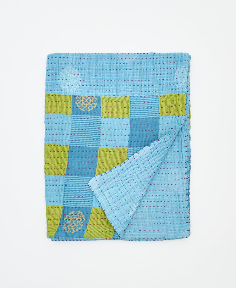 small kantha quilt handmade in India by women artisans from vintage cotton saris