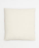 back of stamp throw pillow in natural white