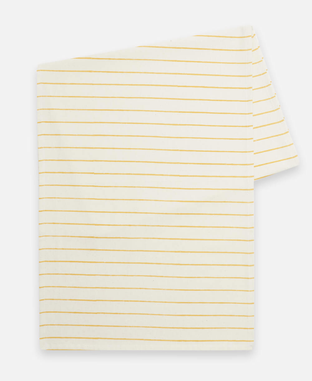 White t-shirt with yellow stripes on a white background