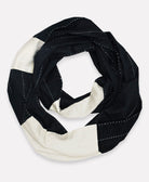 black and white circle scarf with white hand-stitched embroidery