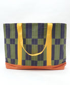 Checkered bag with green, blue, and yellow pattern on a white background
