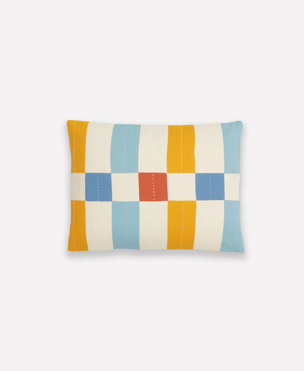 Rectangular small pillow with a colorful checkered pattern on a white background