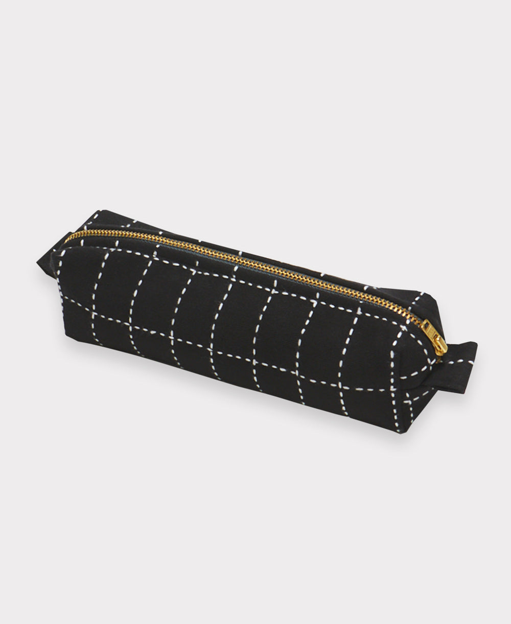 black and white embroidered toiletry bag in a small size made from organic cotton with brass zipper