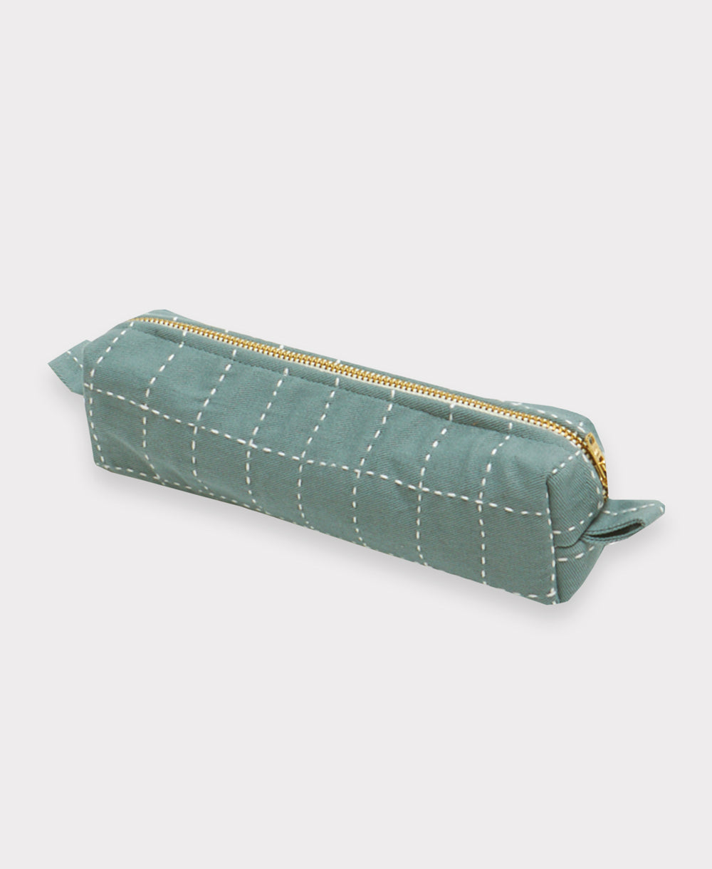 spruce green small toiletry bag with white embroidery