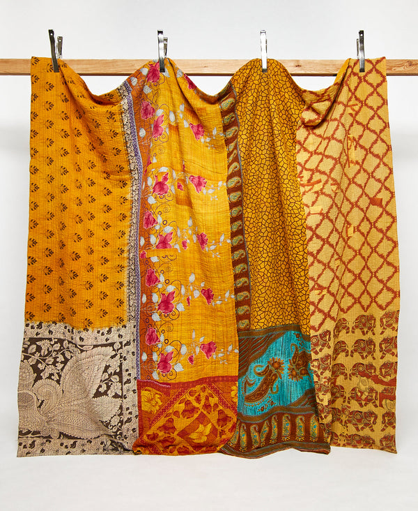 King kantha quilt in a golden yellow traditional pattern handmade in India
