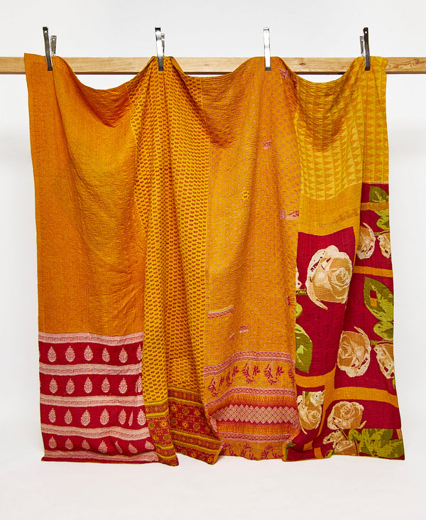 King kantha quilt in orange floral pattern handmade in India
