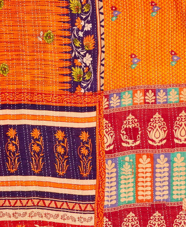 Orange paisley kantha bedding quilt ethically made from vintage cotton fabric
