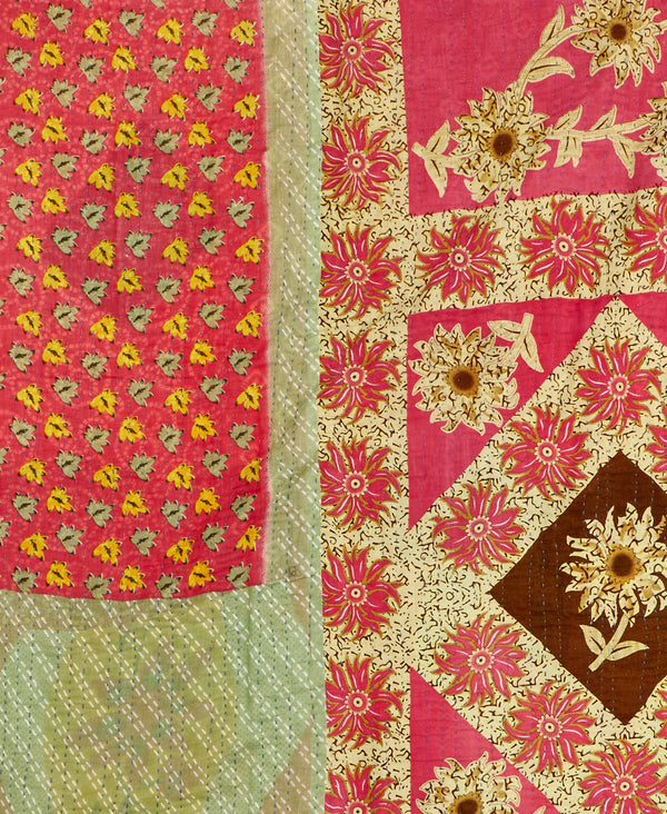 A red floral kantha bedding quilt ethically made from vintage cotton fabric

