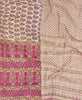 Queen kantha quilt with reversible a maroon paisley pattern
