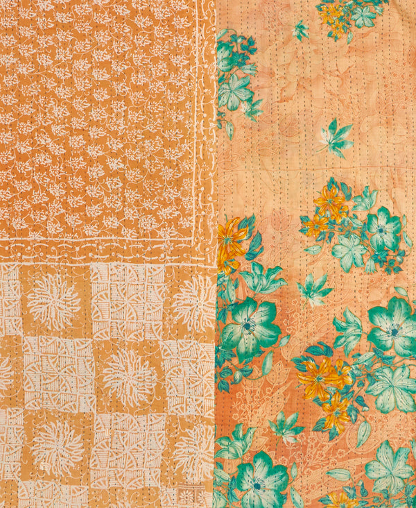 Orange floral kantha bedding quilt ethically made from vintage cotton fabric
