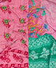 Queen kantha quilt with reversible pink floral pattern
