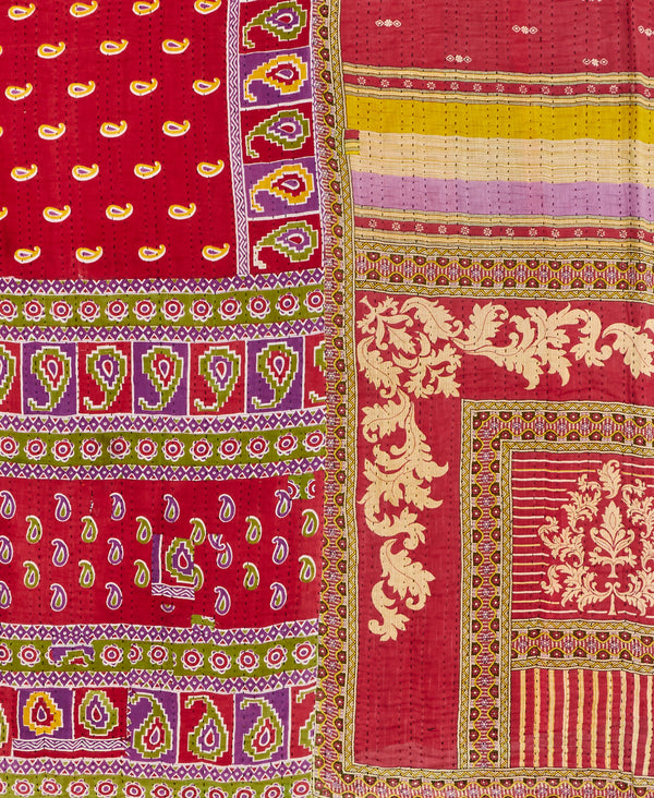 Queen kantha quilt with reversible red paisley pattern
