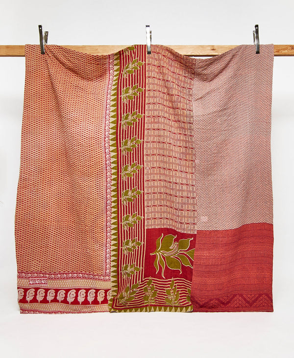 Queen kantha quilt in red and green leaf pattern handmade in India
