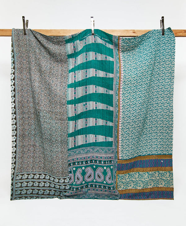 Queen kantha quilt in a teal geometric pattern handmade in India
