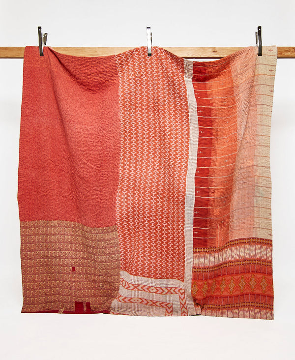 Queen kantha quilt in an orange geometric pattern handmade in India
