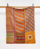 Twin kantha quilt in orange striped pattern handmade in India
