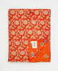Artisan-made twin kantha quilt in orange floral design made from upcycled saris

