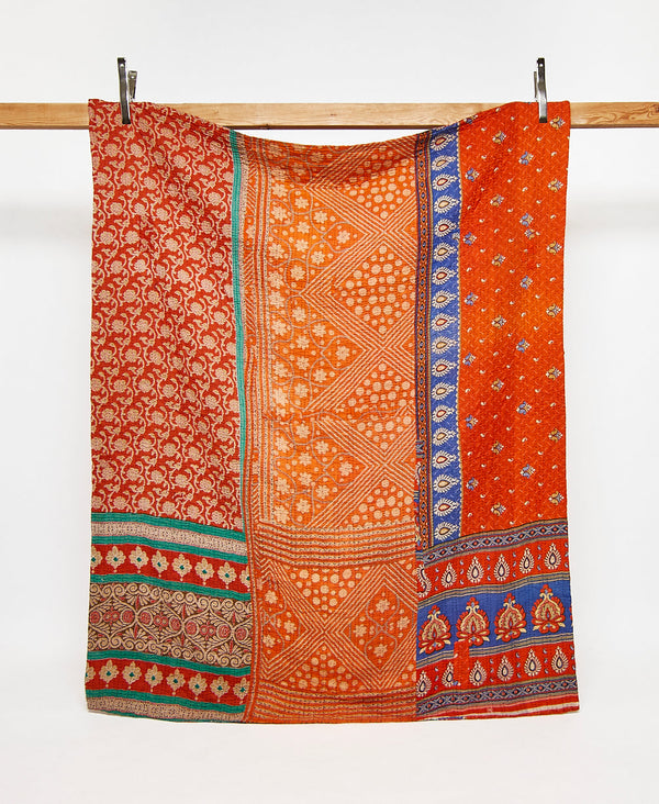 Twin kantha quilt in orange floral pattern handmade in India
