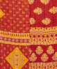 Twin kantha quilt with reversible red and yellow geometric pattern