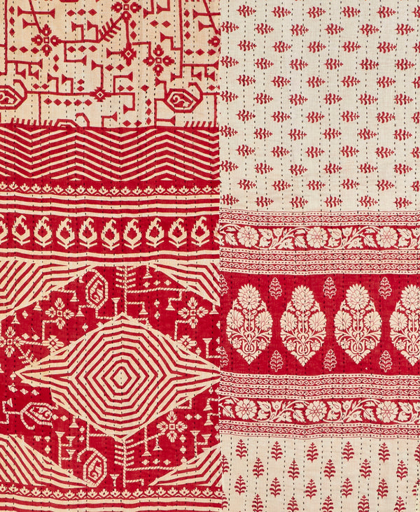 Twin kantha quilt with reversible white and red floral pattern