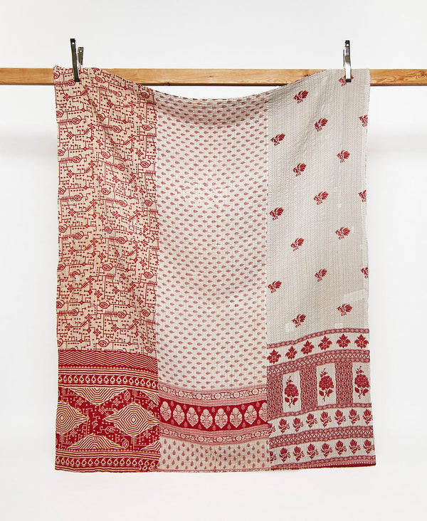 Twin kantha quilt in a white and red floral  pattern handmade in India
