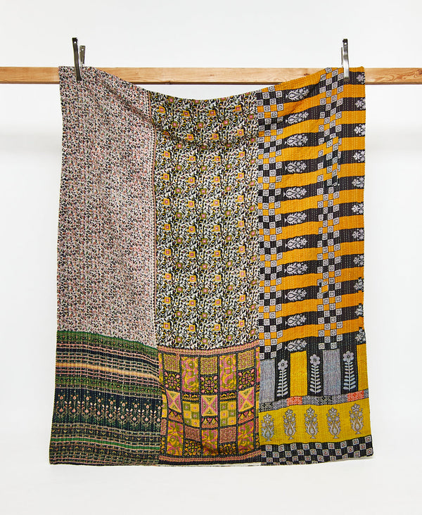 Twin kantha quilt in a green and yellow floral pattern handmade in India
