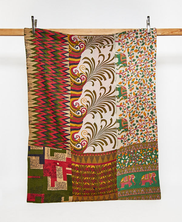 Twin kantha quilt in a green abstract pattern handmade in India