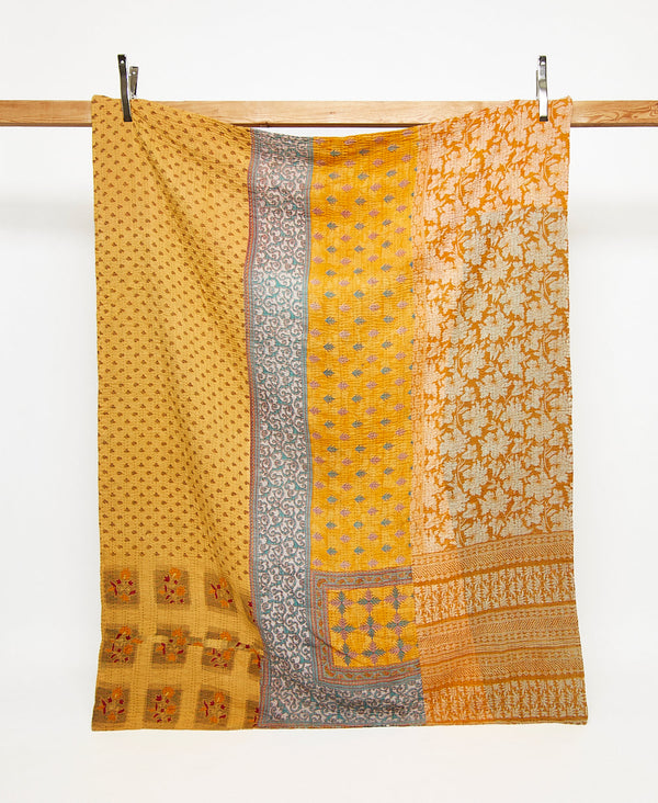 Twin kantha quilt in a yellow floral pattern handmade in India
