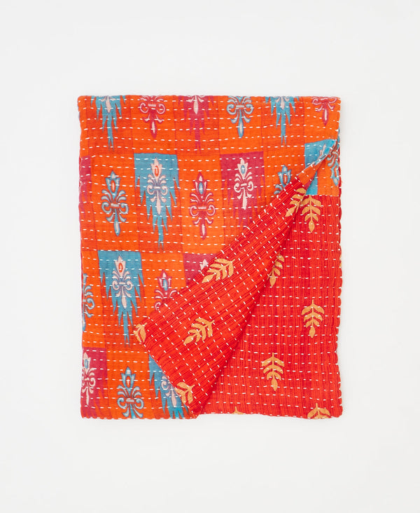 Orange kantha quilt throw made using abstract print 
recycled vintage saris