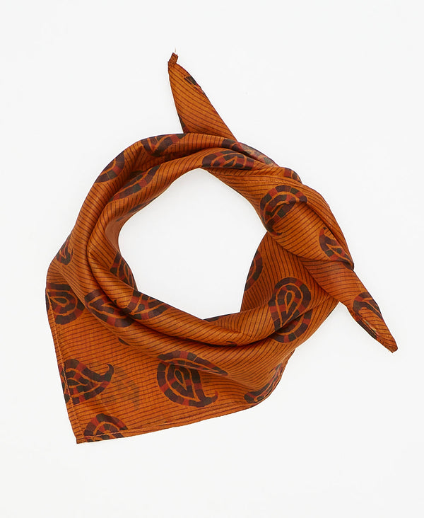 Orange and black silk scarf handmade by women artisans using upcycled saris