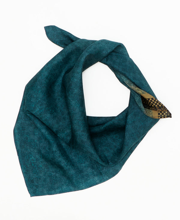 teal vintage silk square scarf featuring small geometric shapes created using sustainably sourced saris