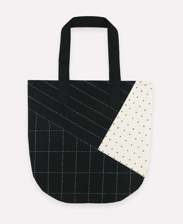 Organic-cotton tote bag with patchwork pattern hand-stitched by artisans