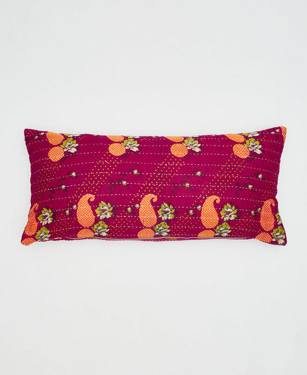 dark pink cotton lumbar pillow with orange paisleys and green flowers