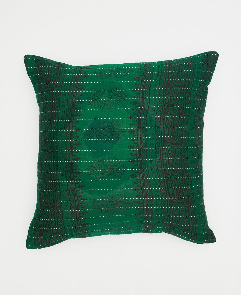 green cotton throw pillow with black paisley details and white traditional kantha stitching 