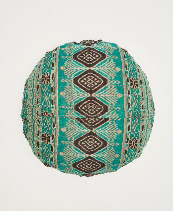 Abstaract blue and tan round throw pillow featuring traditional kantha hand stitching in pink 