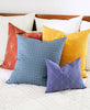modern autumn pillow arrangement with hand-embroidered geometric minimalist designs