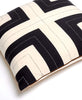 hand-stitched interlock throw pillow in charcoal black and bone ivory