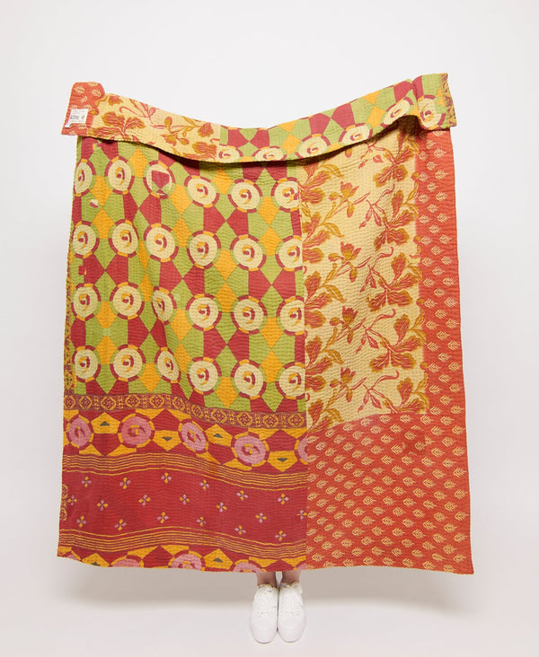 Bold handmade throw quilt created using upcycled vintage saris 