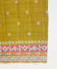 light green ecofriendly bandana featuring a blue, purple, pink , and yellow floral print 