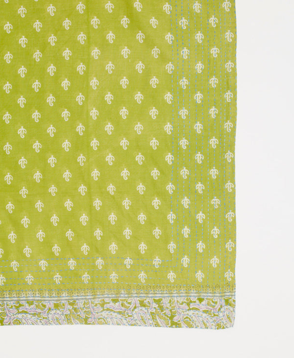 light green ecofriendly bandana with a small white pattern and light blue traditional kantha stitching 