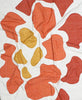 sustainably made quilt featuring an abstract marigold bloom floral design