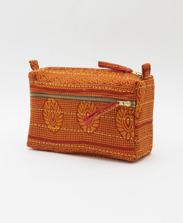 Artisan-made toiletry bag featuring two zippered pouches and yellow kantha stitching 