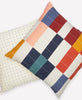 modern hand-embroidered cross-stitch and checkered throw pillows made from organic cotton