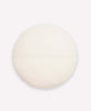 Circular cream white throw pillow made from organic cotton