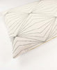 statement lumbar pillow with geometric prism design in ivory