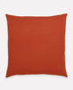 organic cotton throw pillow in rust orange embroidered by Anchal artisans